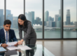 Professional in navy suit reviews KYC documents at glass desk in Singapore bank, with Marina Bay skyline.